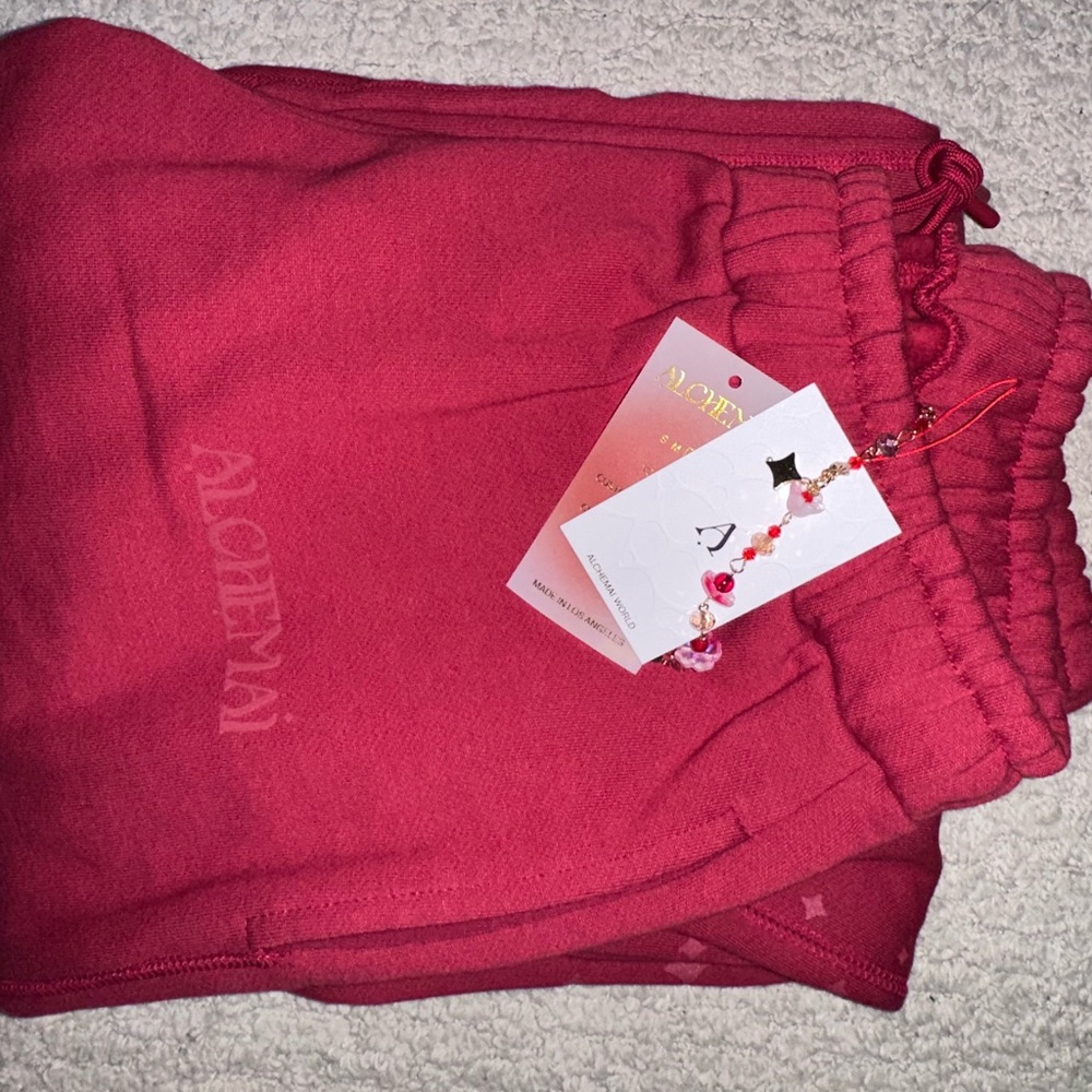 Pink Sweatpants with Elastic Waistband and Soft Fleece-Lined Fabric